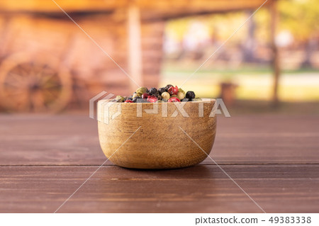 Four colors of peppercorns with cart Four colors of peppercorns with cart 49383338
