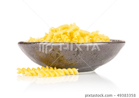Raw italian torti pasta isolated on white Raw italian torti pasta isolated on white 49383358