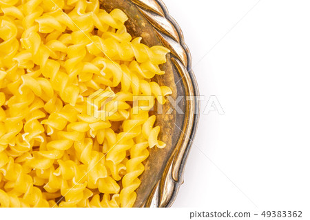 Raw italian torti pasta isolated on white Raw italian torti pasta isolated on white 49383362