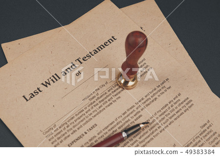 Notary's public pen and stamp on testament and last will. Notary public 49383384