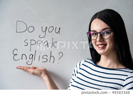 Beautiful girl with glasses and words do you speak English Beautiful girl with glasses and words do you speak English 49383388