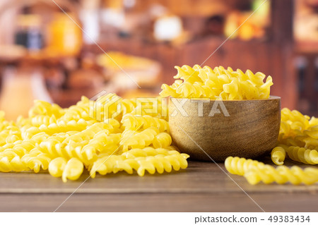 Raw italian torti pasta with rustic kitchen Raw italian torti pasta with rustic kitchen 49383434