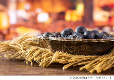 Fresh sweet blueberry with rustic kitchen Fresh sweet blueberry with rustic kitchen 49383791