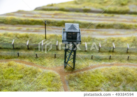 Model of prison guard tower, photograph taken from inside the prison Model of prison guard tower, photograph taken from inside the prison 49384594