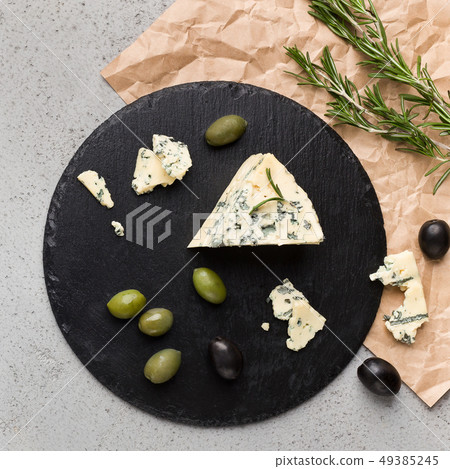 Blue cheese on black board 49385245