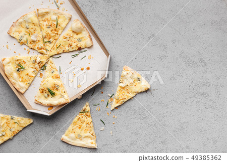 Pizza four cheese in delivery box, top view 49385362