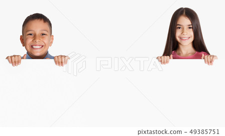 Kids holding blank advertising board, copy space 49385751