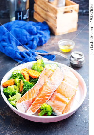 salmon with salad 49387636