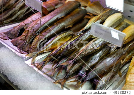 Variety of sea fishes on the counter. 49388273