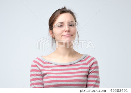 woman is not sure and does not believe you. 49388491