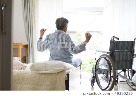 Seniors in pajamas, rear view Seniors in pajamas, rear view 49390256