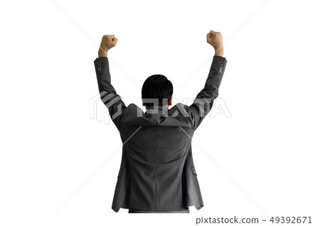Successful business man raising hand isolated on 49392671