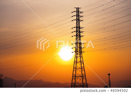Orange twilight and power lines Orange twilight and power lines 49394502