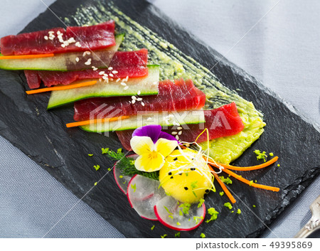 Tuna carpaccio with avocado sauce Tuna carpaccio with avocado sauce 49395869