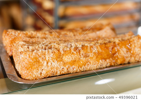 Tray with sweet pastry on bakery showcase Tray with sweet pastry on bakery showcase 49396021