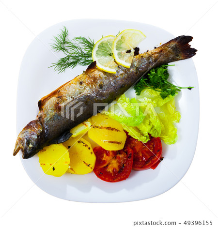 Baked trout with vegetables 49396155