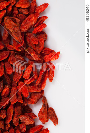 Вried goji berries on white surface Вried goji berries on white surface 49396246