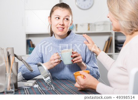 Woman having conversation with daughter 49398514