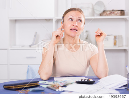 Woman facing financials troubles Woman facing financials troubles 49398667