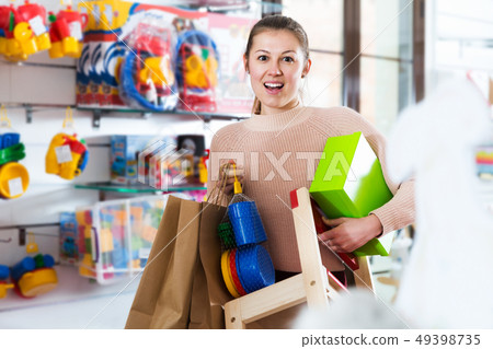 Woman in kids toys shop 49398735