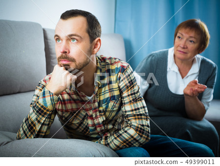 Mother and son arguing Mother and son arguing 49399011