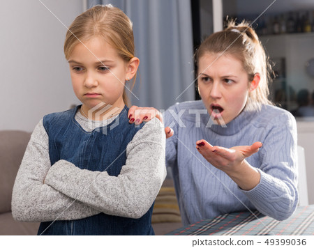 Mom scolds little daughter. Crisis of motherhood 49399036