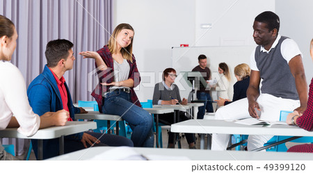 Students enjoying free time in class Students enjoying free time in class 49399120