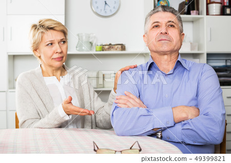 Mature couple quarrels 49399821