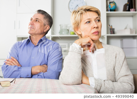 Mature couple quarrels 49399840