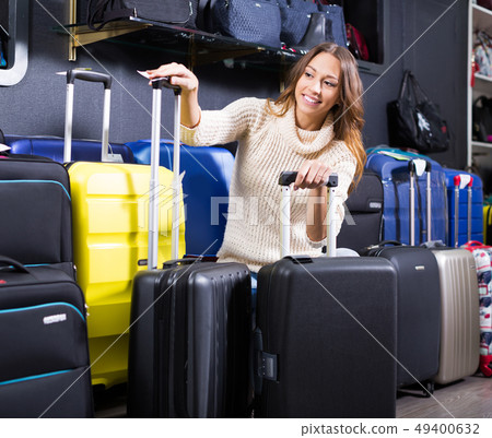 Woman selecting handy trunk 49400632