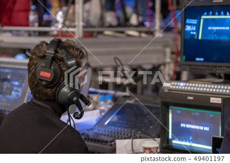 Video broadcast operator workis at business conference 49401197