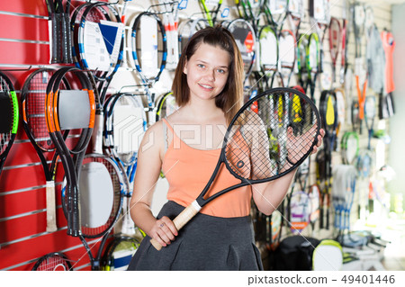 Pretty girl with racket 49401446