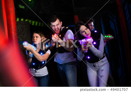 Group of people on laser tag arena Group of people on laser tag arena 49401707