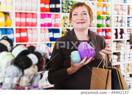 Woman with accessories for needlework Woman with accessories for needlework 49402137