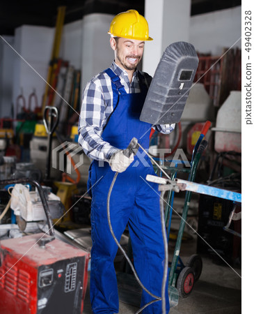 Positive working man practicing his skills 49402328