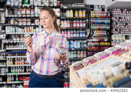 Woman shopping color in glass jar Woman shopping color in glass jar 49402882