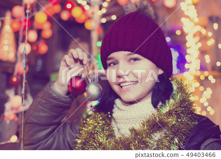Ordinary female with Christmas gifts Ordinary female with Christmas gifts 49403466