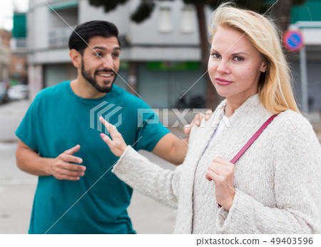 Husband and wife are emotional quarreling Husband and wife are emotional quarreling 49403596
