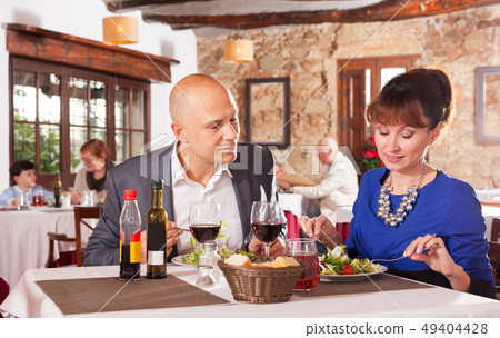 Adult couple at restaurant Adult couple at restaurant 49404428