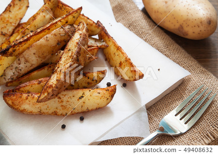 Healthy baked potatoes on white paper. Healh and 49408632