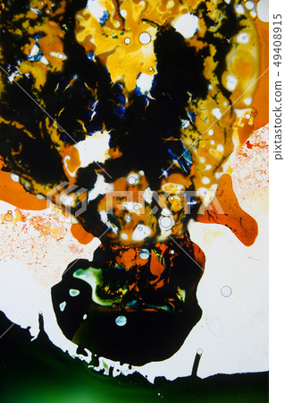 Colorful liquids mixed together to abstract shapes 49408915