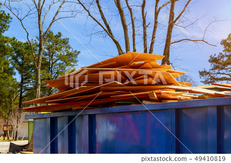 Old and used construction material in the new 49410819