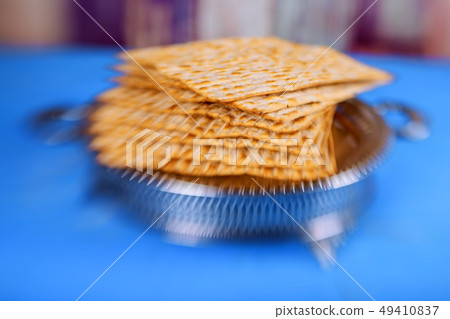 Matzo for Passover with metal tray on table 49410837