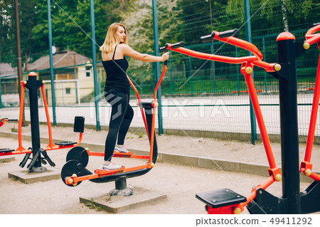 Sports girl in a park  49411292