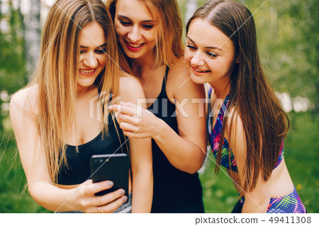 Sports girls in a park Sports girls in a park 49411308