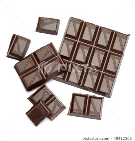 Dark organic chocolate pieces isolated on white background 49412506