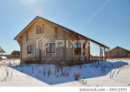 Wooden house at winter, unfinished construction, Wooden house at winter, unfinished construction, 49412840