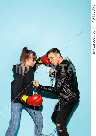 Close up fashion portrait of two young pretty hipster teens Close up fashion portrait of two young pretty hipster teens 49413353