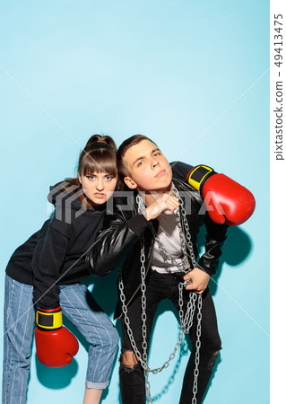 Close up fashion portrait of two young pretty hipster teens Close up fashion portrait of two young pretty hipster teens 49413475