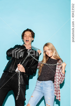 Close up fashion portrait of two young pretty hipster teens Close up fashion portrait of two young pretty hipster teens 49413502